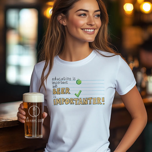 Woman wearing a white tee shirt saying 'Education is important but beer is importanter' in typographical style holding a beer in a bar setting.
