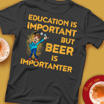 Black tee shirt saying 'Education is important but beer is importanter' in cartoon style lay flat with beer glasses