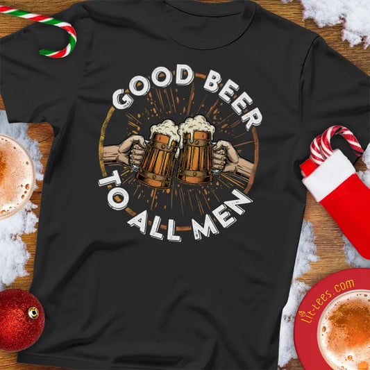 Black t-shirt with 'Good Beer to All Men' graphic on a festive background with hot chocolate and candy canes.