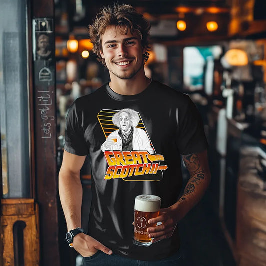 Man wearing a t-shirt with 'Great Scotch' design holding a drink in a bar setting